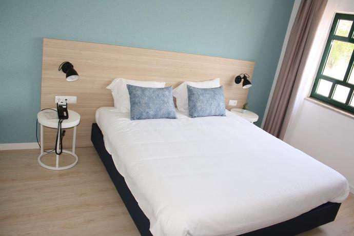 Imagen de la habitación del Hotel Flag Santarém. Foto 6