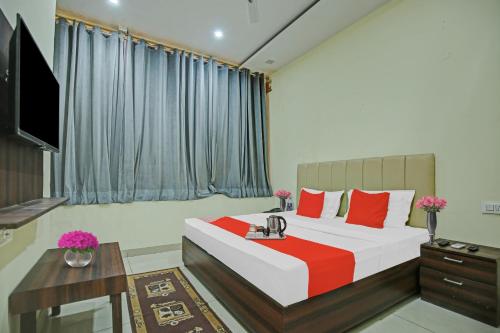 Imagen de la habitación del Hotel Flagship Lavish. Foto 19