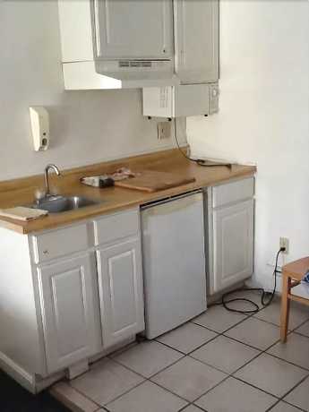 Imagen de la habitación del Hotel Flagship Motor Court. Foto 8