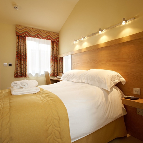 Imagen de la habitación del Hotel Flagship Winford Manor. Foto 2