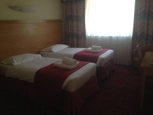 Imagen de la habitación del Hotel Flagship Winford Manor. Foto 3