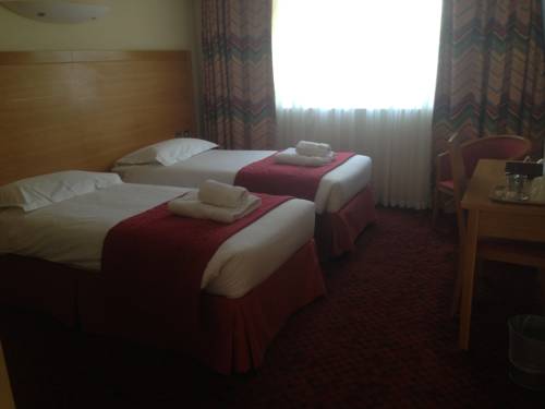 Imagen de la habitación del Hotel Flagship Winford Manor. Foto 4