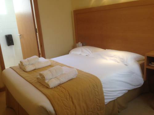 Imagen de la habitación del Hotel Flagship Winford Manor. Foto 8