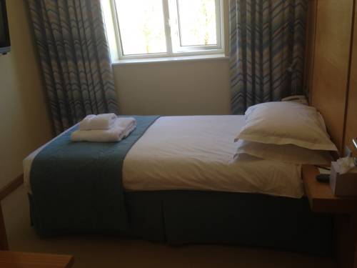 Imagen de la habitación del Hotel Flagship Winford Manor. Foto 10