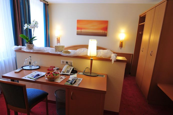 Imagen de la habitación del Hotel Flair Deutsches Haus. Foto 13