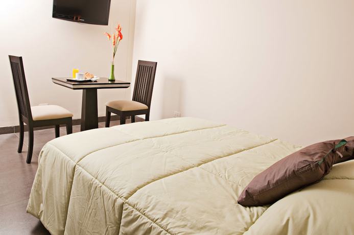 Imagen de la habitación del Hotel Flamante and Suite. Foto 2