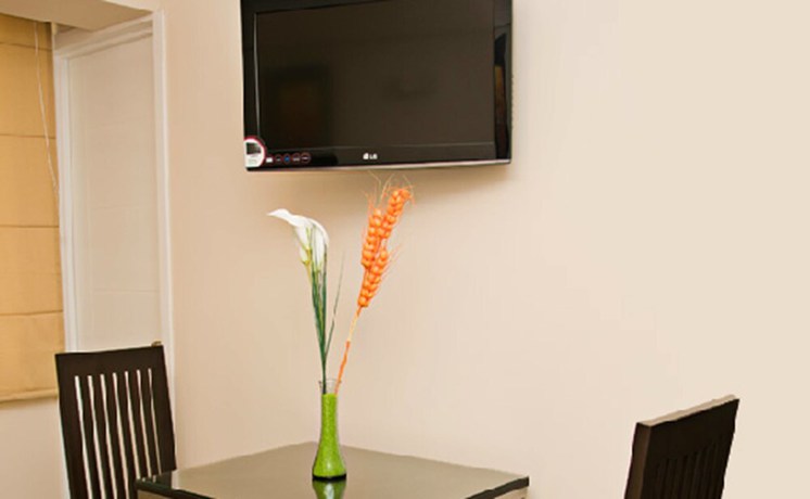 Imagen de la habitación del Hotel Flamante and Suite. Foto 6