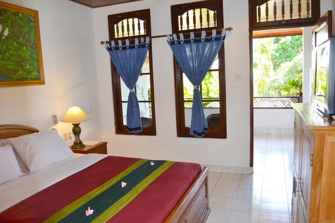 Imagen de la habitación del Hotel Flamboyan, Tuban. Foto 2