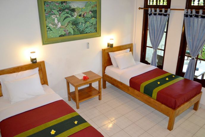 Imagen de la habitación del Hotel Flamboyan, Tuban. Foto 5