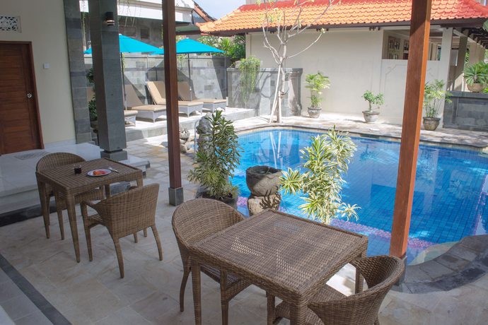 Imagen de la piscina del Hotel Flamboyan, Tuban. Foto 17