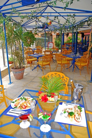Imagen del bar/restaurante del Hotel Flamboyant - Le Village. Foto 1