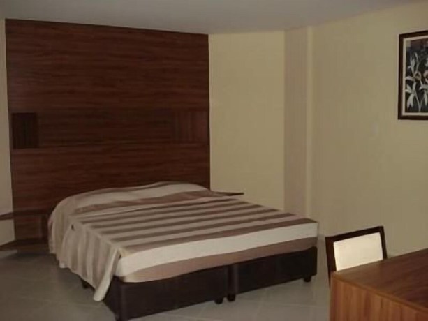 Imagen de la habitación del Hotel Flamboyant Suite. Foto 10