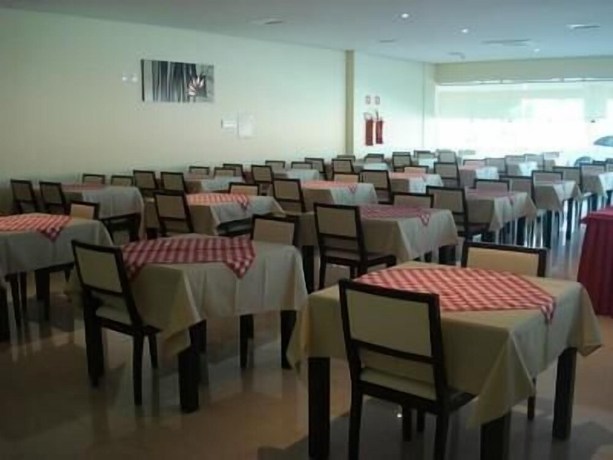 Imagen del bar/restaurante del Hotel Flamboyant Suite. Foto 3