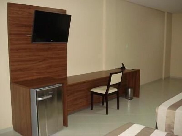 Imagen de la habitación del Hotel Flamboyant Suite. Foto 11