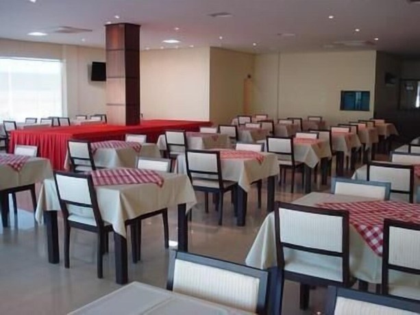 Imagen del bar/restaurante del Hotel Flamboyant Suite. Foto 4