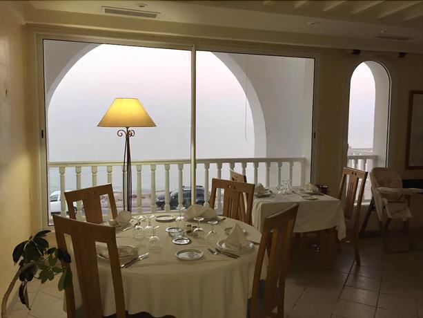 Imagen del bar/restaurante del Hotel Flamingo Beach, Mezraya. Foto 8