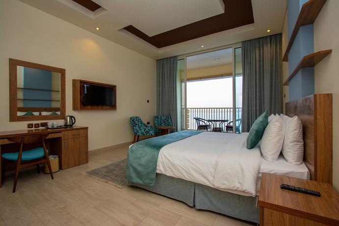 Imagen de la habitación del Hotel Flamingo Beach Resort. Foto 8