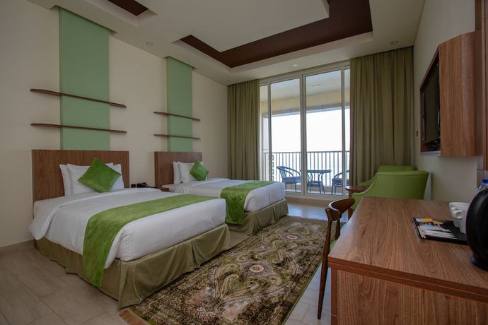 Imagen de la habitación del Hotel Flamingo Beach Resort. Foto 18