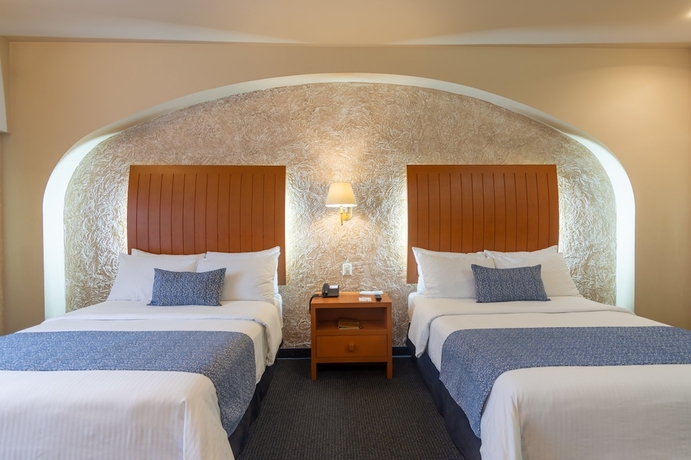 Imagen de la habitación del Hotel Flamingo Inn. Foto 6