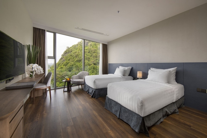Imagen de la habitación del Hotel Flamingo Premium Cat Ba Beach Resort. Foto 6