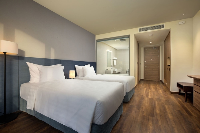 Imagen de la habitación del Hotel Flamingo Premium Cat Ba Beach Resort. Foto 7