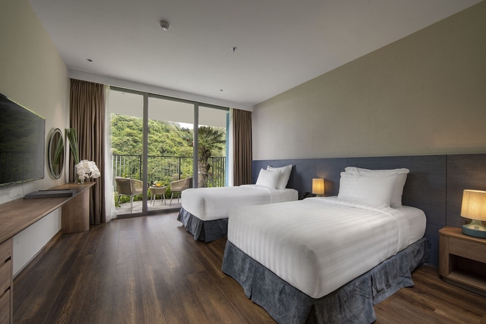 Imagen de la habitación del Hotel Flamingo Premium Cat Ba Beach Resort. Foto 8