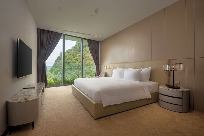 Imagen de la habitación del Hotel Flamingo Premium Cat Ba Beach Resort. Foto 11