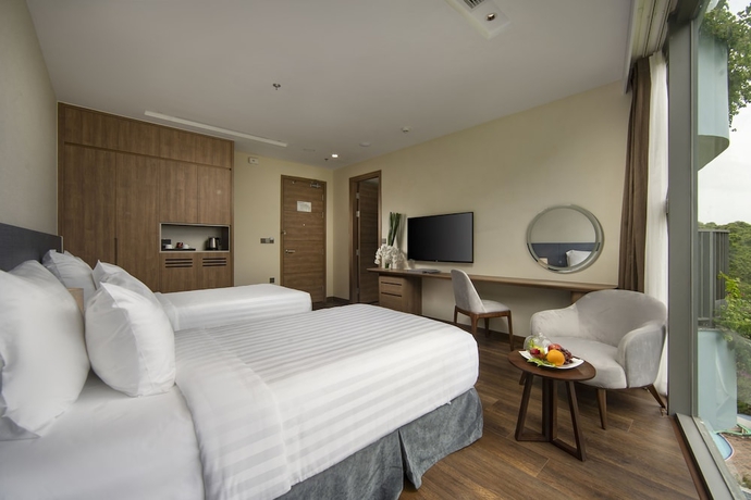 Imagen de la habitación del Hotel Flamingo Premium Cat Ba Beach Resort. Foto 16