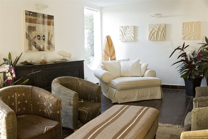 Imagen de los interiores del Hotel Flamingo Resort, SANTA MARGHERITA DI PULA. Foto 14