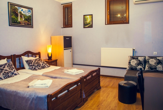Imagen de la habitación del Hotel Flamingo, Tbilisi. Foto 8