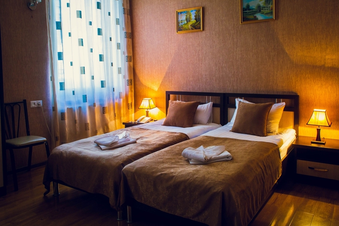 Imagen de la habitación del Hotel Flamingo, Tbilisi. Foto 16