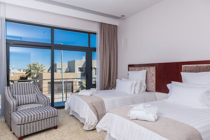 Imagen de la habitación del Hotel Flamingo Villa Boutique. Foto 3