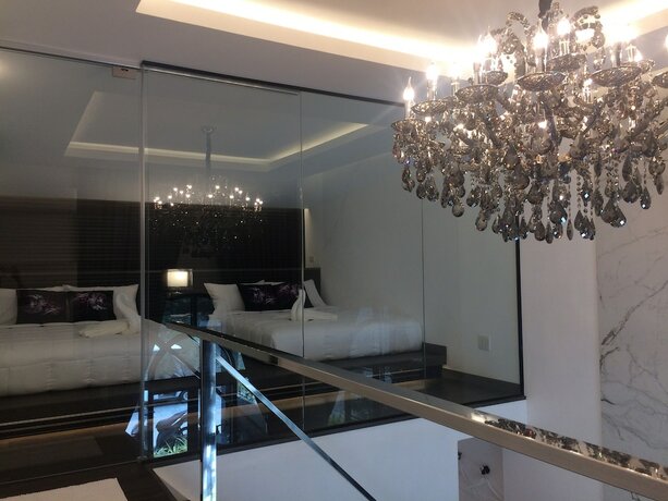 Imagen de la habitación del Hotel Flamingo Villa. Foto 8