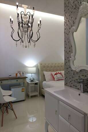 Imagen de la habitación del Hotel Flamingo Villa. Foto 10