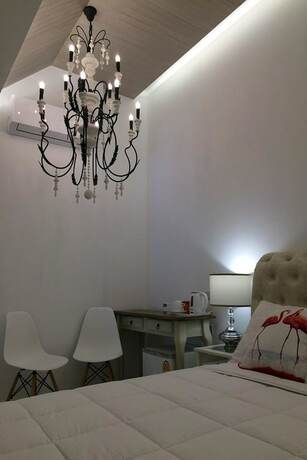 Imagen de la habitación del Hotel Flamingo Villa. Foto 18