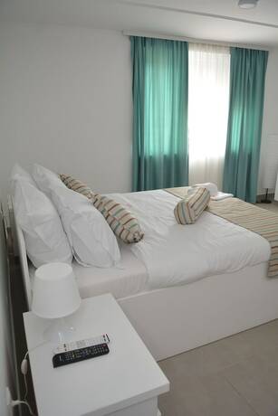Imagen de la habitación del Hotel Flamingo resort, Belgrado. Foto 11