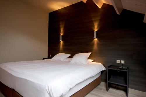 Imagen de la habitación del Hotel Flanders Lodge Hotel. Foto 7