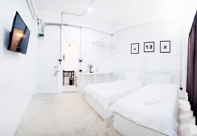 Imagen de la habitación del Hotel Flat White Cafe X Poshtel. Foto 4