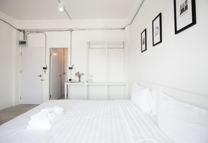 Imagen de la habitación del Hotel Flat White Cafe X Poshtel. Foto 8