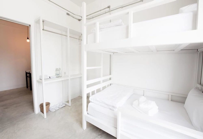 Imagen de la habitación del Hotel Flat White Cafe X Poshtel. Foto 10