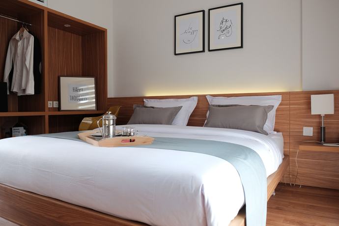 Imagen de la habitación del Hotel Flat06 Tendean. Foto 2