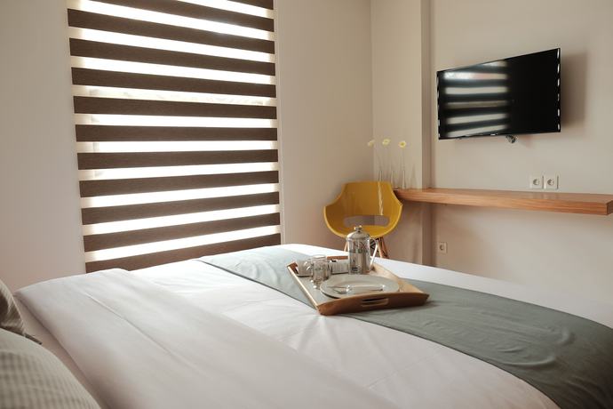 Imagen de la habitación del Hotel Flat06 Tendean. Foto 9