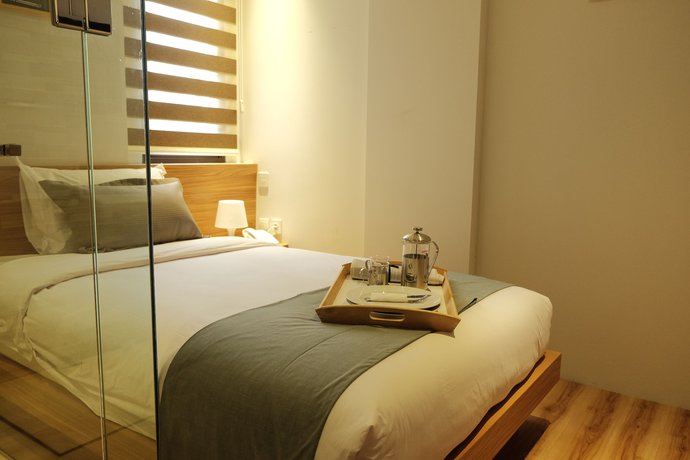 Imagen de la habitación del Hotel Flat06 Tendean. Foto 15