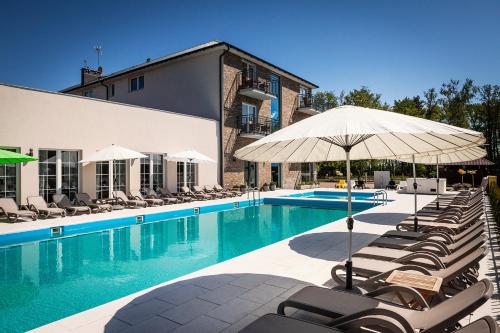 Imagen de la piscina del Hotel Flauta Niechorze. Foto 7