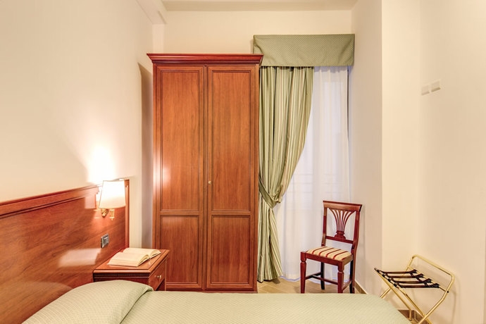 Imagen de la habitación del Hotel Flavio Rome. Foto 2