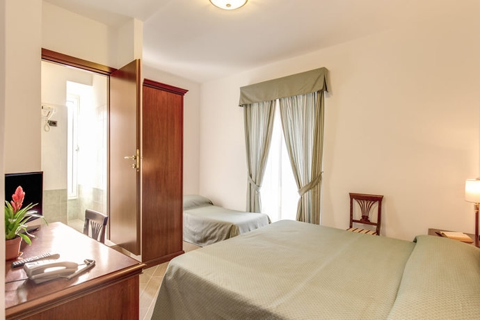 Imagen de la habitación del Hotel Flavio Rome. Foto 3