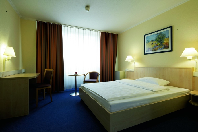 Imagen de la habitación del Hotel Flemings Frankfurt-Central. Foto 7