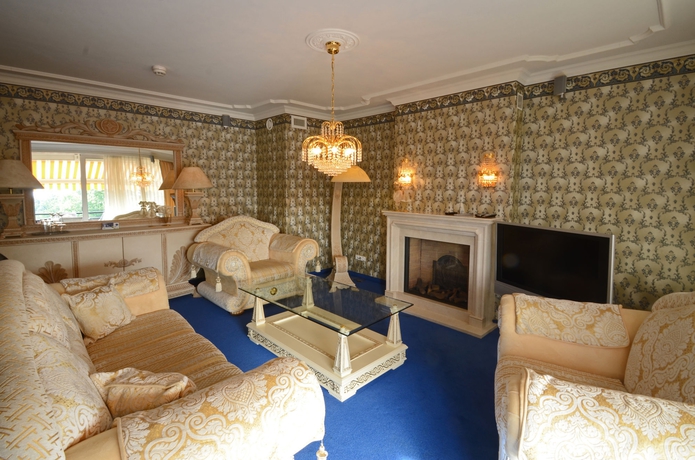 Imagen de los interiores del Hotel Fletcher Familiehotel De Hunzebergen. Foto 13