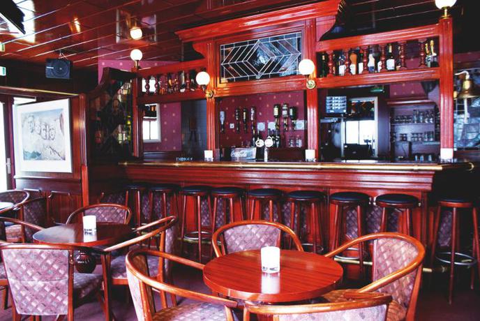 Imagen del bar/restaurante del Hotel Fletcher Nieuwvliet Bad. Foto 7