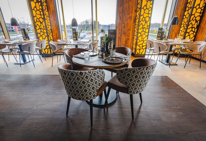 Imagen del bar/restaurante del Hotel Fletcher Restaurant ByZoo Emmen. Foto 6